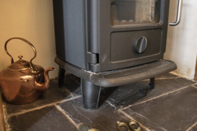 Wood burning stove in our guest lounge Wood burning stove in our guest lounge